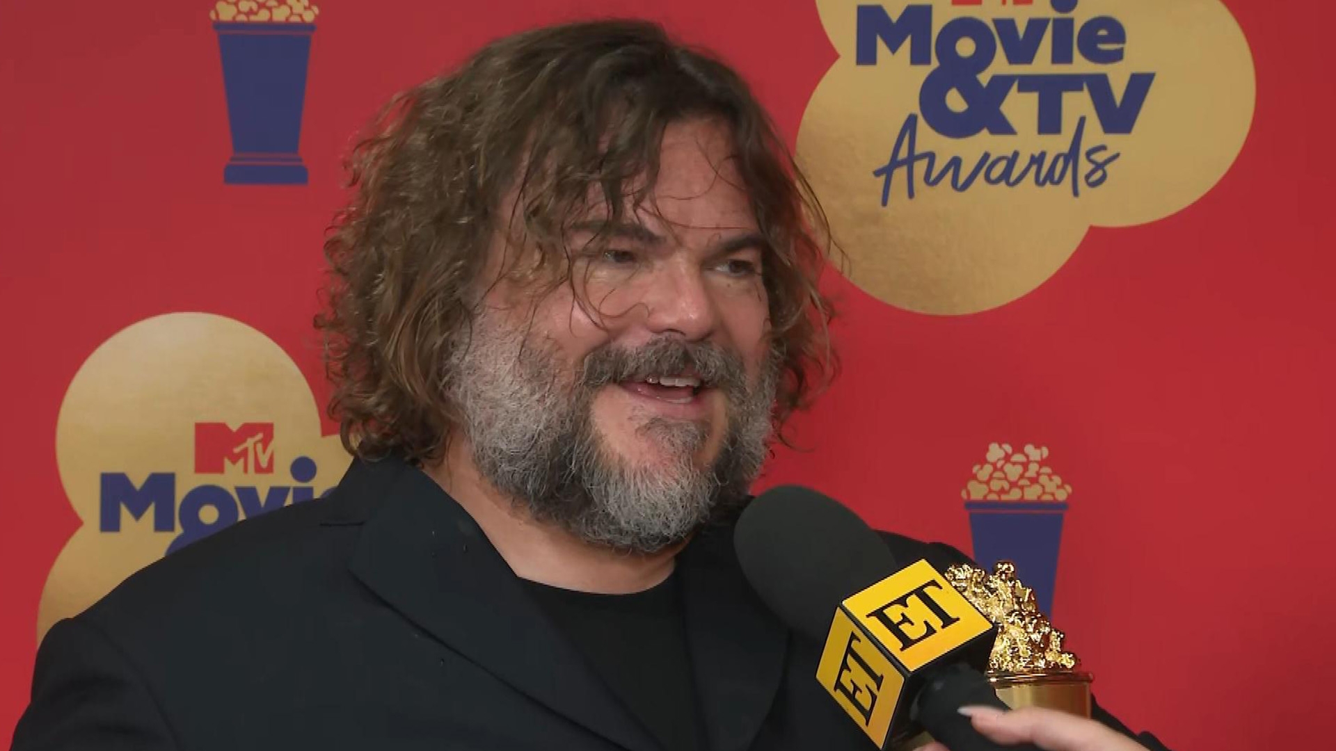 Jack Black somersaults onstage at MTV Movie and TV Awards