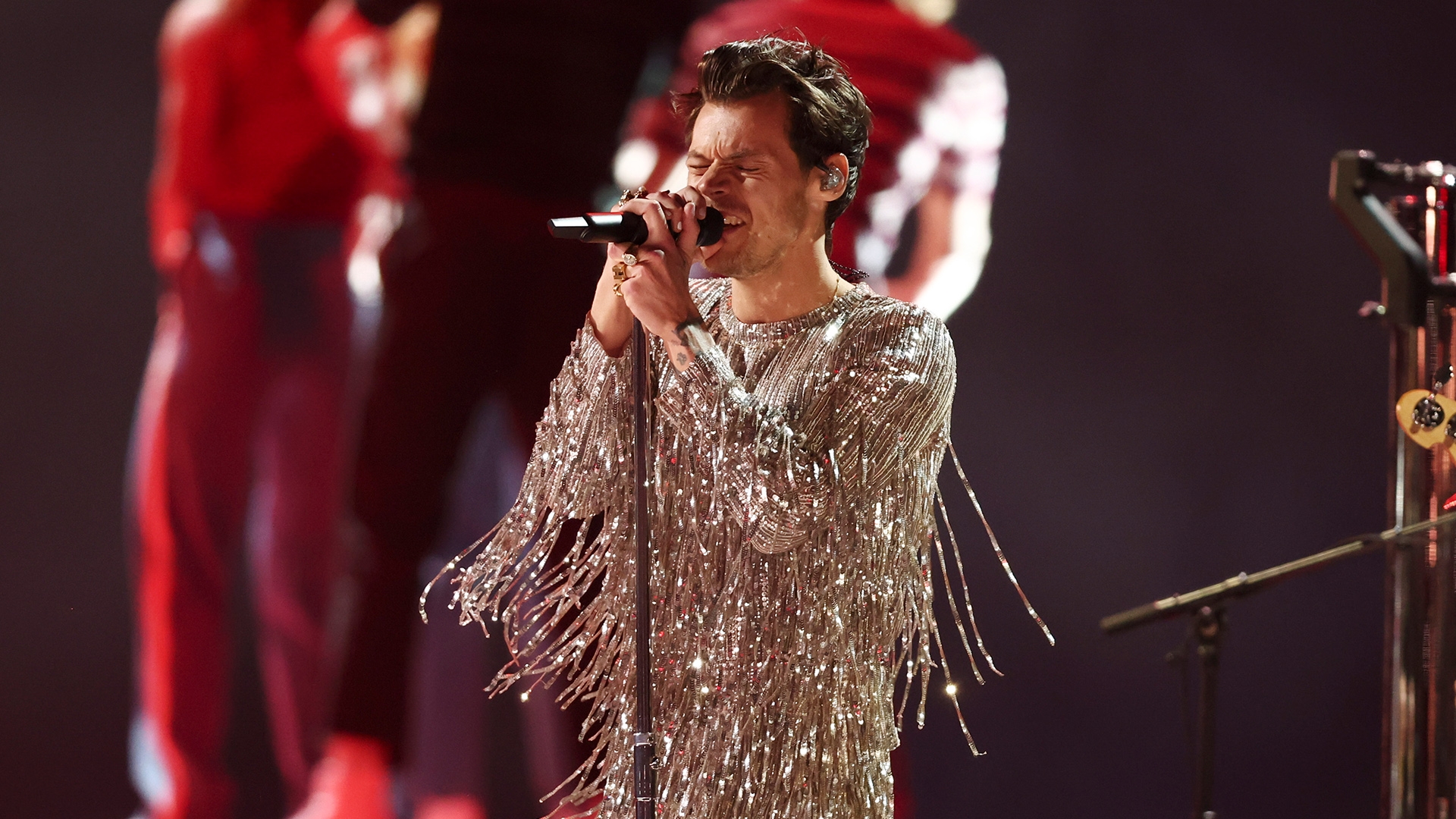 Harry Styles' Grammy fashion: Rainbow jumpsuit divides social media